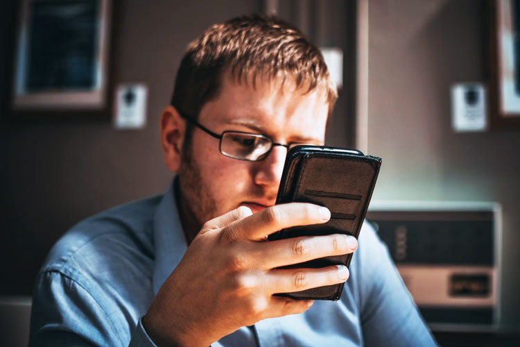 man reading phone